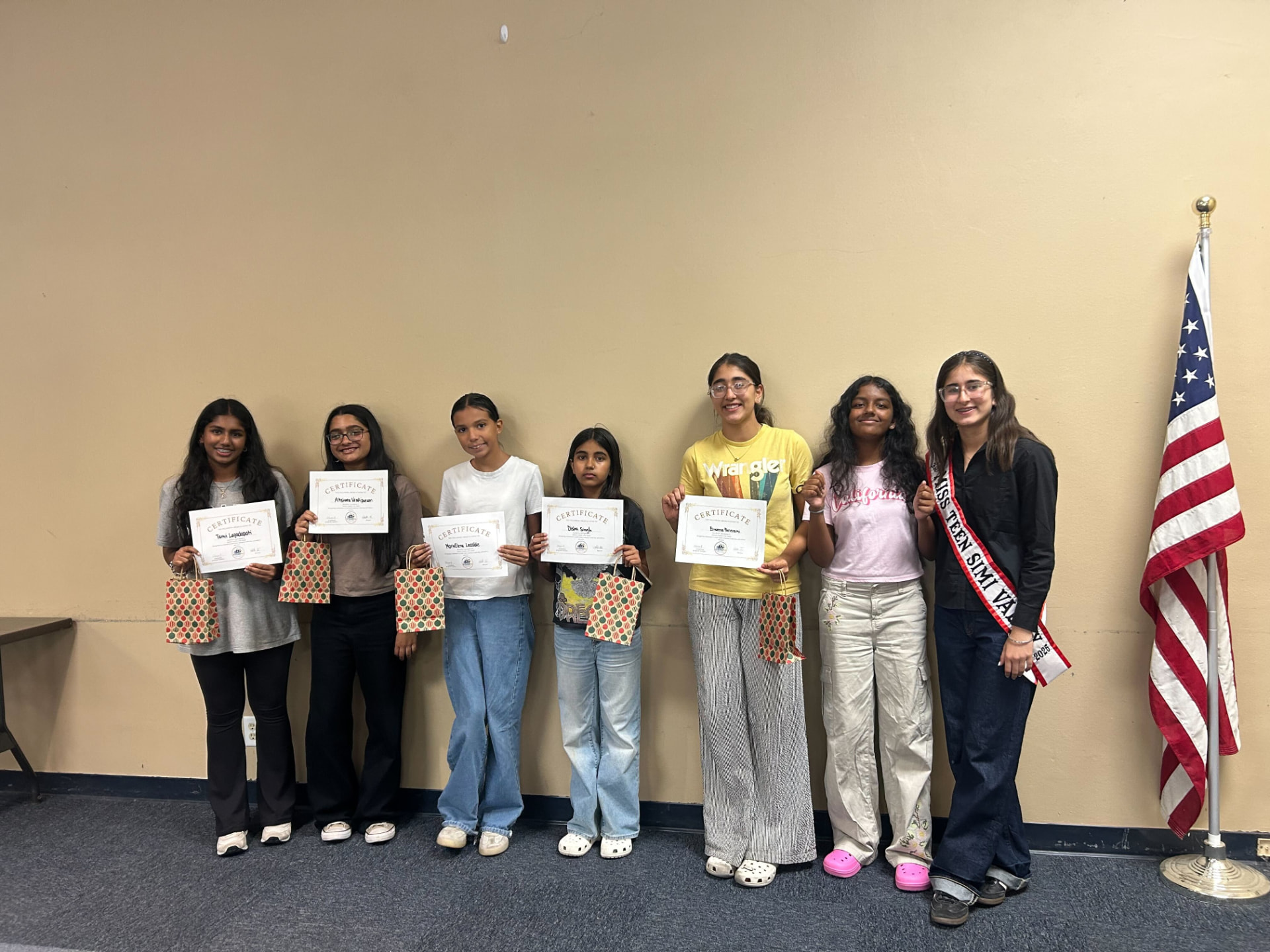 STEMORA summit participants holding certificates of completion